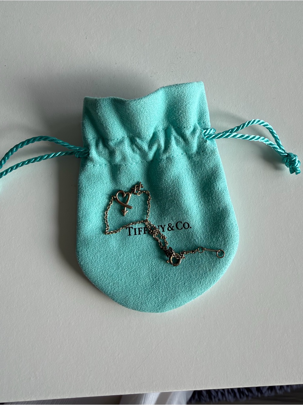 Tiffany & Co. Silver Heart Tag bracelet with Signature Turquoise Pouch